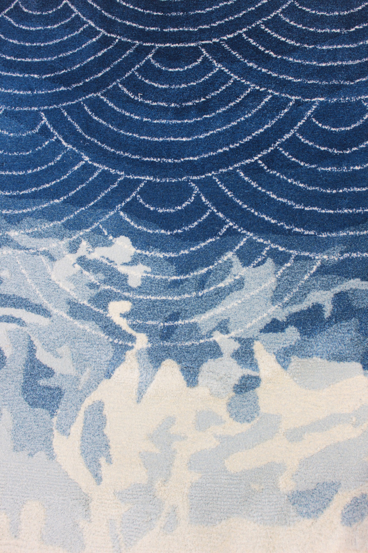 Close-up of Atlântico, geometric waves dissolving into sea foam